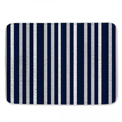 Tapis de bain bleu à rayures