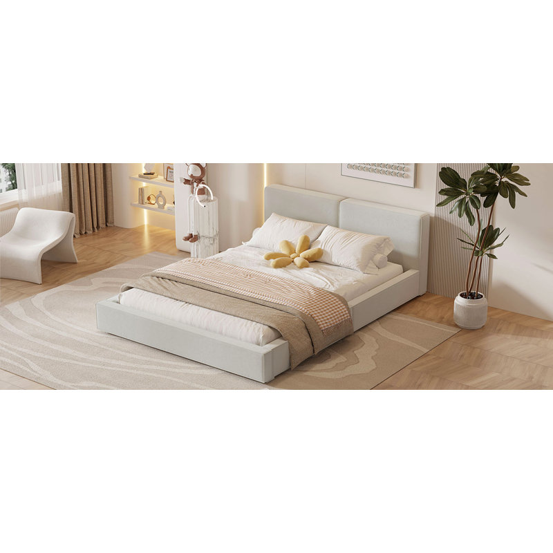 Grand lit plateforme tapissier avec tissu en velours