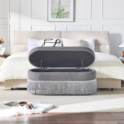 Oval Storage Ottoman Bench with Fringe, 39" Fabric Upholstered Footrest Stool with Hinged Lid, Mid-Century Modern Boho Coffee Table for Living Room, Bedroom, Bed End