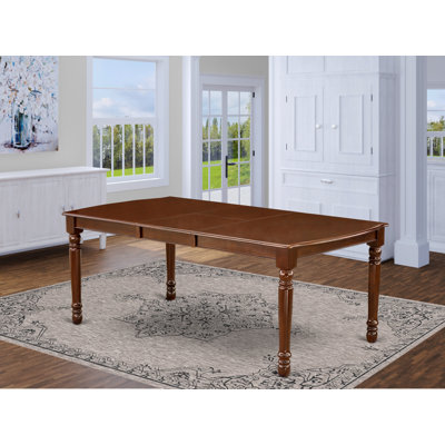 Wellhead Extendable Solid Wood Dining Table by Charlton Home