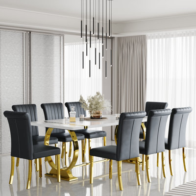 Ensemble de 8 chaises de salle à manger en cuir noir avec pieds dorés en miroir