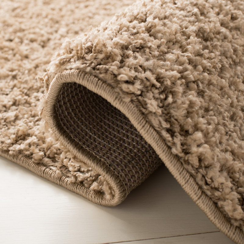 Helsel Shag Performance Machine Washable Solid Color Rug, Round 6'7"