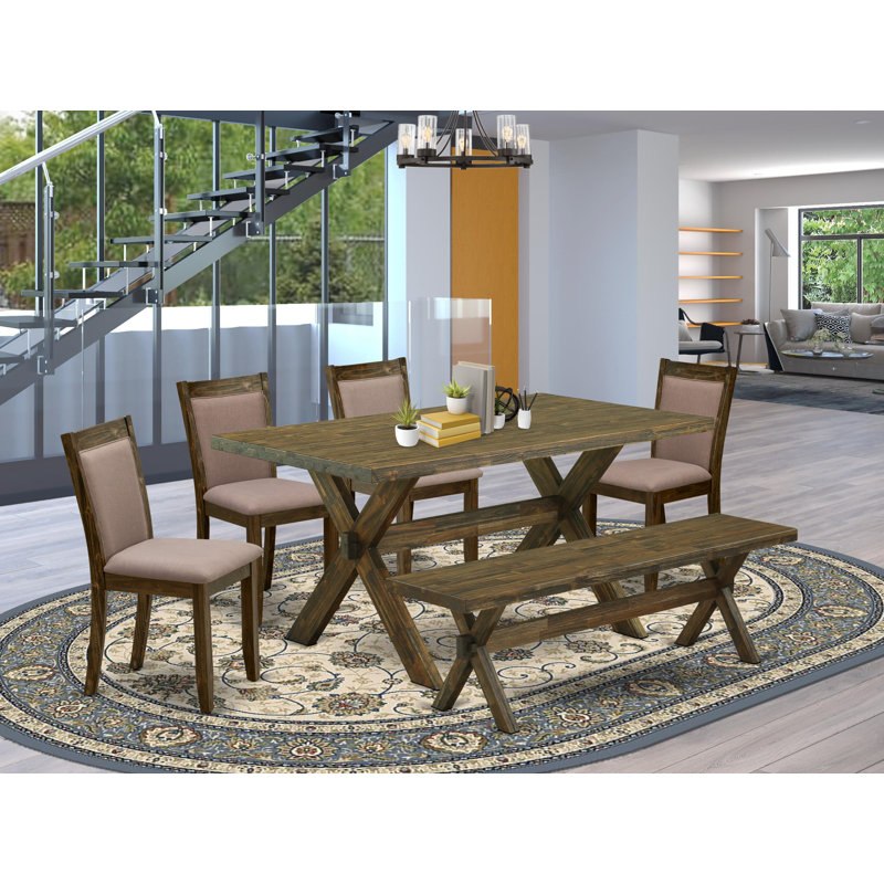 L'ensemble de table de salle à manger 6 pièces contient une table de salle à manger rectangulaire avec des pieds en X et 4 chaises Parson en tissu de café avec un banc, patiné
