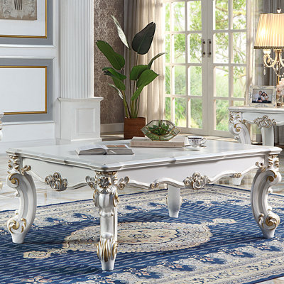 Table basse antique en perle avec ornement de pattes à volutes - Améliore la zone de relaxation des pieds complexes, idéale pour un usage domestique