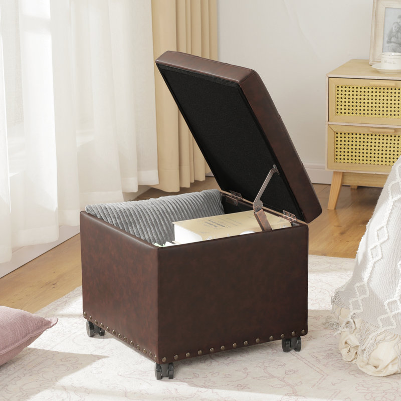 Clariece 17.7" Square Faux Leather Storage Ottoman with Casters, Brown 