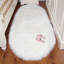 Oval 180 cm x 100 cm Faux Sheepskin Area Rug