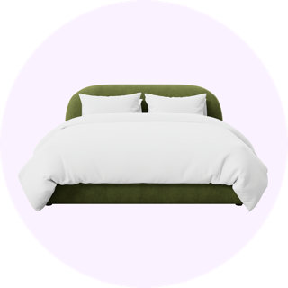 Olive green upholstered bed with white bedding