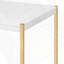 Table basse blanche et dorée