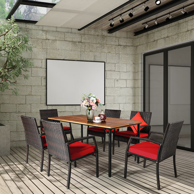 Reeltown 6 - Person Acacia Wicker Patio Dining Set with Rectangular Table , Cushions Included