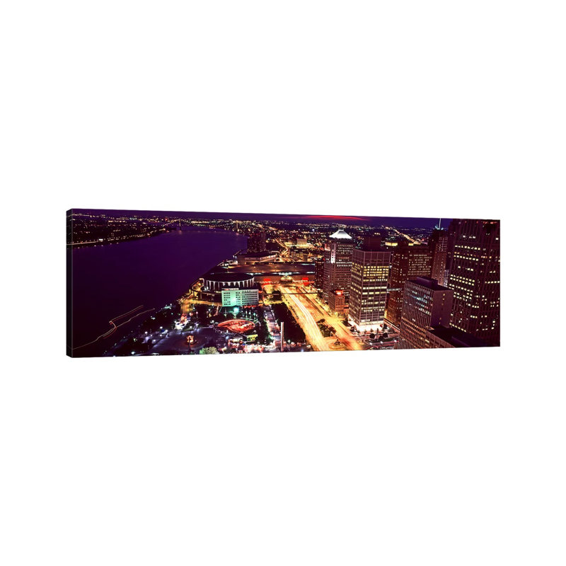 High Angle View Of Buildings Lit Up At Night, Detroit, Michigan, USA by Panoramic Images - Wrapped Canvas Panoramic Print