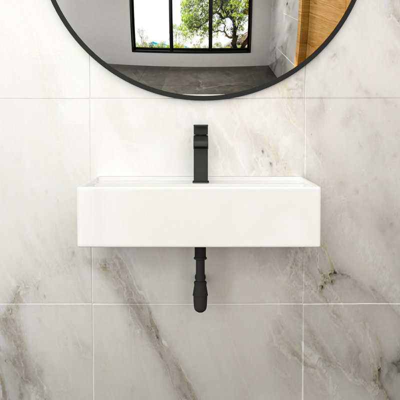 Lavabo mural rectangulaire en céramique blanche de 24 x 16 po, avec trop-plein, durable et compatible avec les robinets. Facile à nettoyer, rebord avant surélevé avec barrière anti-éclaboussures.