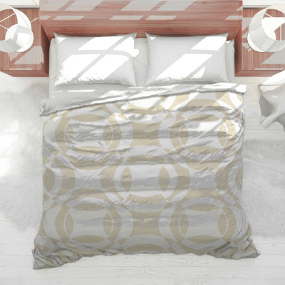 Édredon beige à motif circulaire