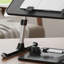 Table pliable noire pour ordinateur portable, réglable en hauteur et en angle, convenant aux lits, aux canapés et aux tours.