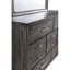 Commode contemporaine en grain de bois gris avec boutons en métal et tiroirs de rangement