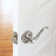 Scroll Satin Nickel Privacy Bed/Bath Door Lever with 6-Way Latch