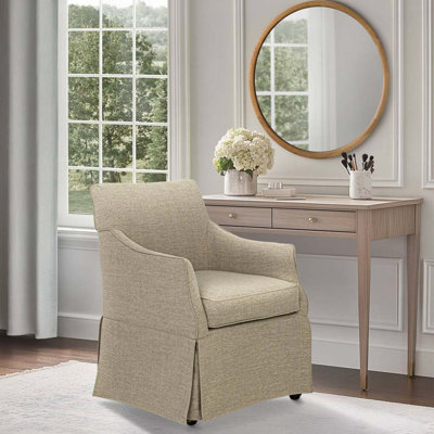 Fauteuil rembourré à jupe avec roulettes cachées