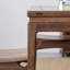 Un bureau en bois d'orme avec des tiroirs cachés-62888929
