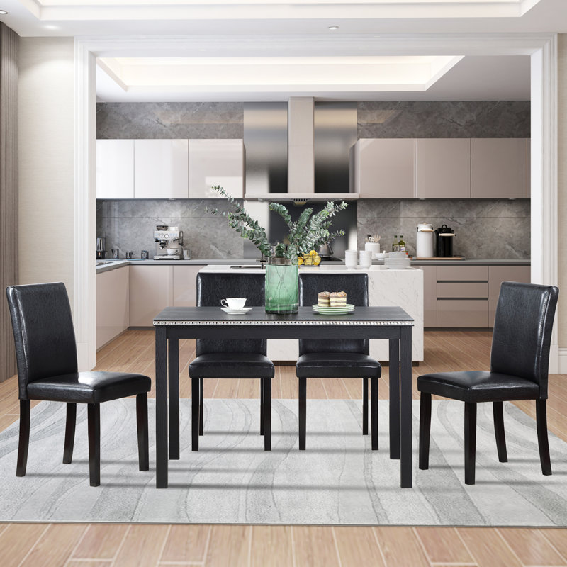 Compact wooden rectangular dining table: space-saving black design for 4 people, perfect for small kitchens & dining areas