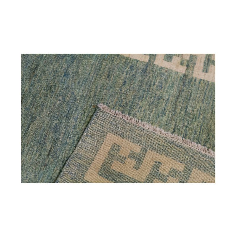 Tapis vert noué à la main de haute qualité