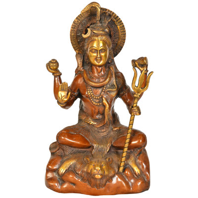 Bénédiction du dieu Shiva tenant un trident (Trishul)