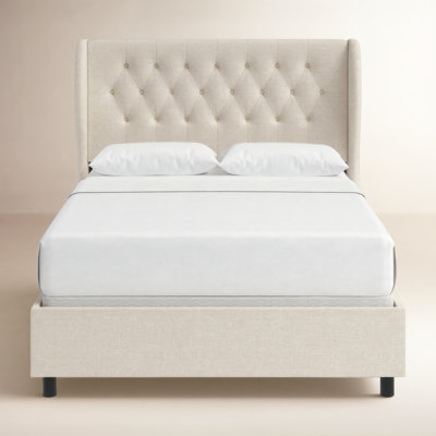 Tomey Upholstered Wingback Bed