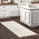 Kerry Textured Geometric Tasseled Area Rug