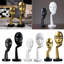 Adsett Face Sculpture-946902647-1021888386