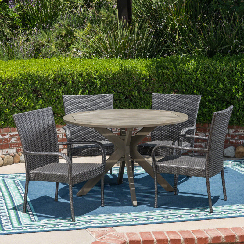 Thresher 4 - Person Acacia Wicker Patio Dining Set with Round Table