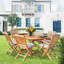 Outdoor 7 - Piece Teak Dining Set with Cushions