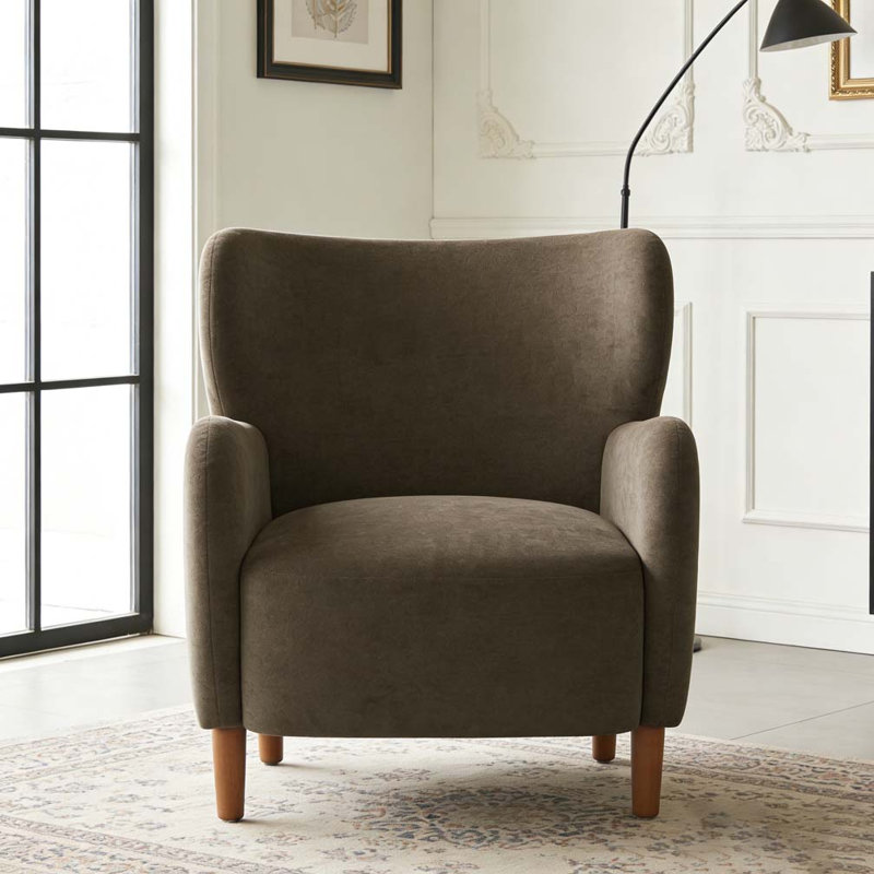 Fauteuil club rembourré à oreilles