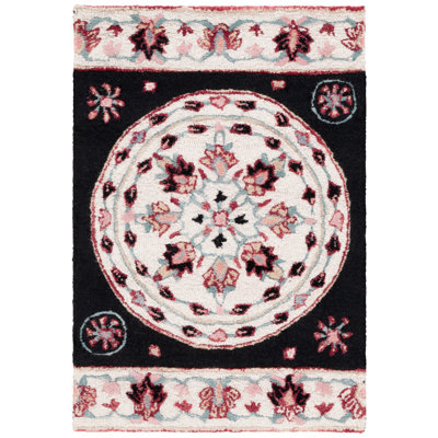 Dajsha Hand Tufted Wool Floral Rug