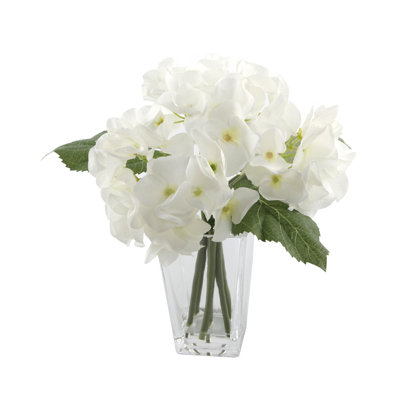 Arrangement floral hortensias et pièce maîtresse en vase