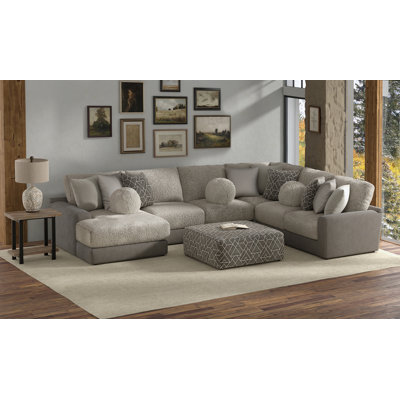 Canapé modulaire 4 pièces avec coussins de siège personnel Stafford, coussins décoratifs inclus et repose-pieds cocktail