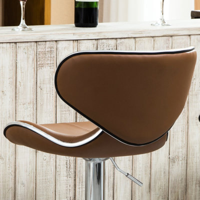 Pivot réglable de 2 chameaux. Base pour la stabilité. Siège en similicuir avec coussin. Rotation à 360 degrés. Tissu d'ameublement chameau idéal - injecté de mousse et repose-pieds pour rehausser tout salon