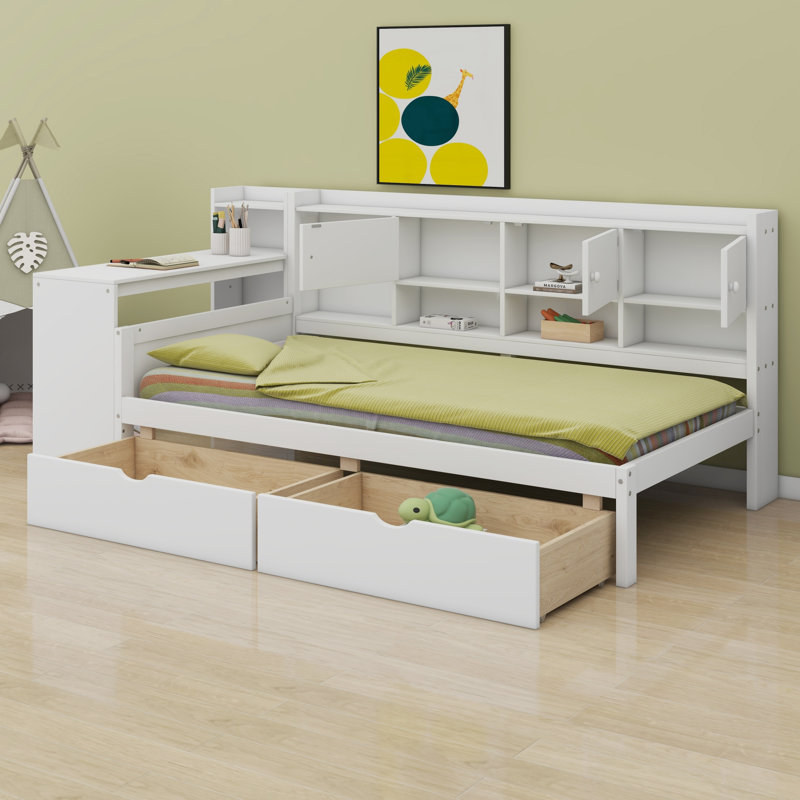 Lit de jour en L peu encombrant, armoires de rangement, tiroirs de rangement sous le lit, bureau d'étude intégré, tablettes intégrées
