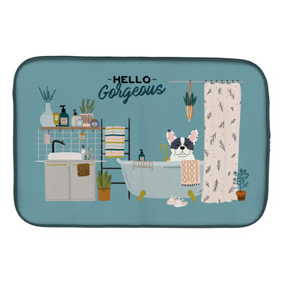 Tapis de séchage caniche dans la baignoire