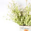 Arrangement de fleurs de soie artificielles en pot