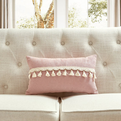Tissu en chenille avec détails pompon et coussin en polyester