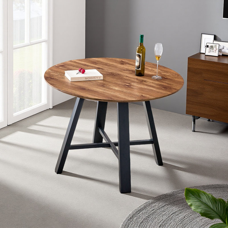 Une table de salle à manger circulaire en bois moderne et minimaliste. Bureau en bois aggloméré de 42 pouces de diamètre