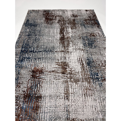 Tapis rectangulaire Doshia avec envers antidérapant