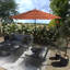 Parasol de patio en bronze 11 pi avec nervures en fibre de verre et col inclinable à Astoria-303157319