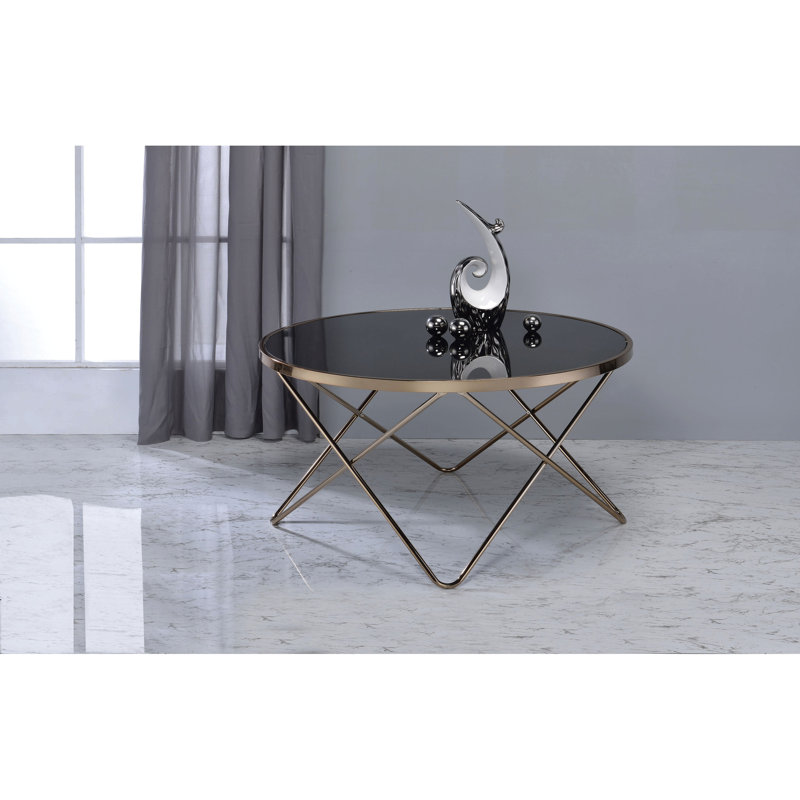 Table basse chic décorative en verre noir et champagne