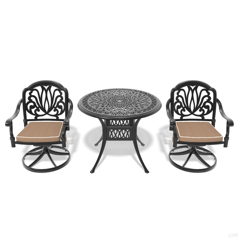 L'ensemble de salle à manger en fonte d'aluminium toutes saisons comprend des chaises pivotantes et une table avec un cadre noir