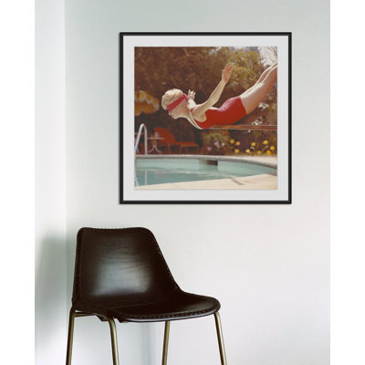Young Woman In Blindfold Balancing On Diving Board Giclee Print by Getty Images