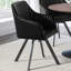Fauteuil pivotant cannelé à accoudoirs inclinés
