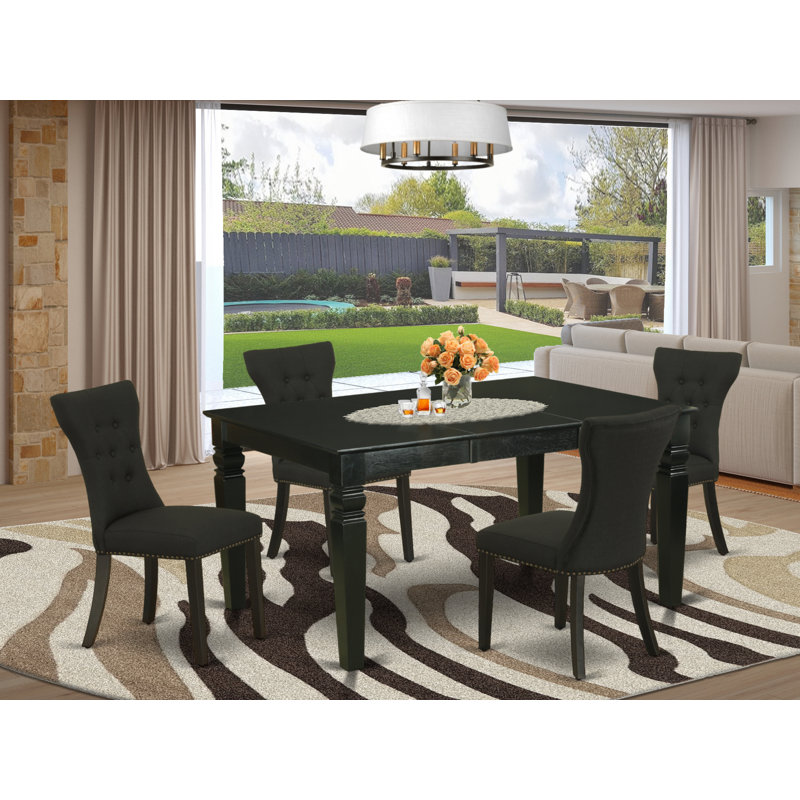 L'ensemble de 5 tables de cuisine pour 4 personnes comprend une table de salle à manger rectangulaire avec rallonge papillon et 4 chaises Parsons en tissu noir, noir