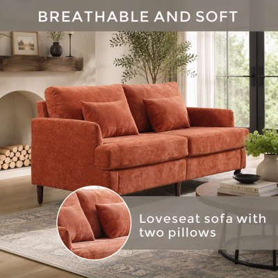 Canapé deux places de style années 50, 175 cm, chenille grise, pieds en bois brun, idéal pour le salon ou la chambre.