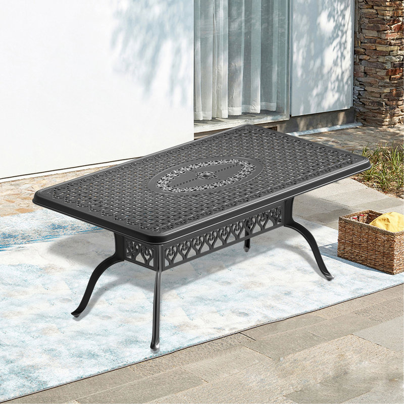 Table de salle à manger en fonte d'aluminium avec cadre noir et trou pour parasol