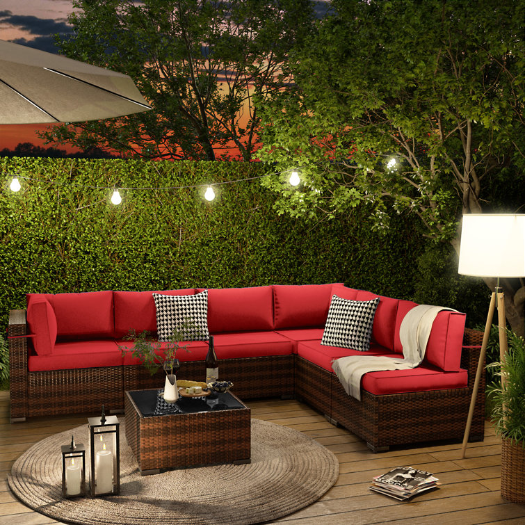 Keyala 7 Piece Rattan Sectional Seating Group with Cushions