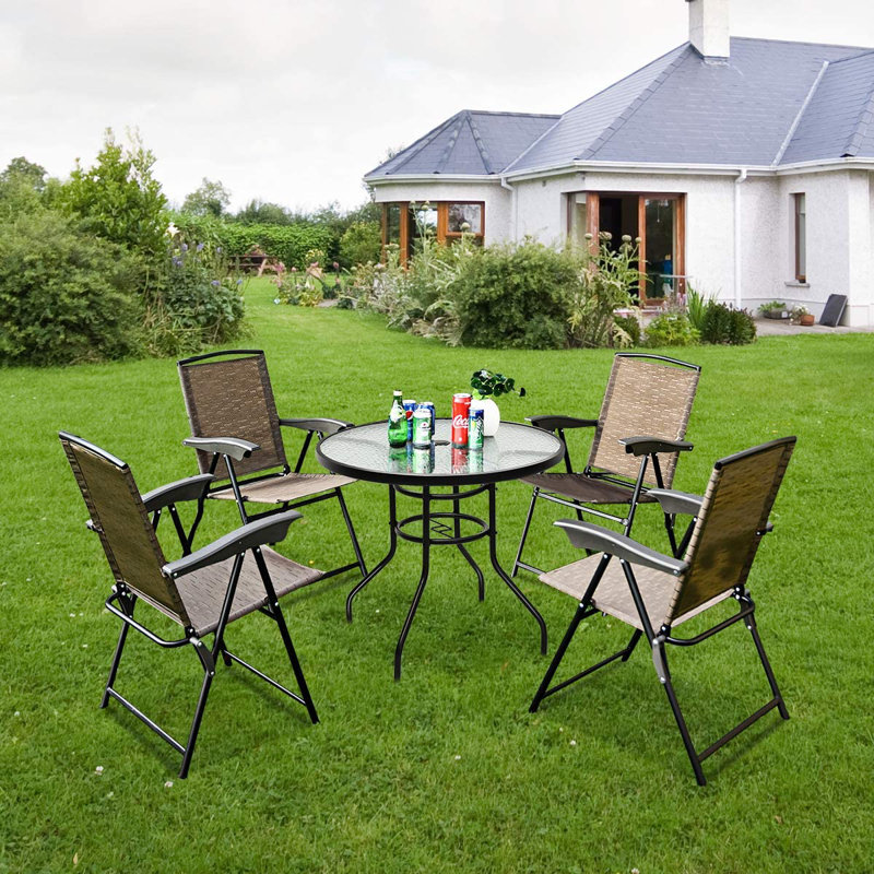 Misael 4 - Person Patio Dining Set with Round Table